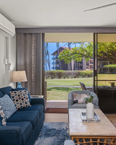 Open living room with ocean view and tropical breeze